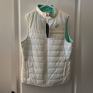 Asics Women's White Quilted Vest with teal lining.